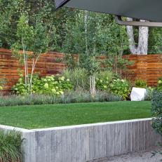 Backyard With Siding Wall