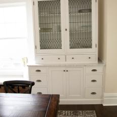 Victorian White Dining Room with White Built-in Cabinet