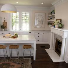 Victorian White Kitchen with White Fireplace 