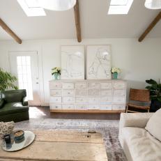 Contemporary White Living Room with Brown Exposed Beams 