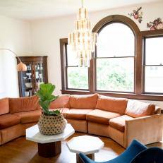 Neutral Victorian Living Room with Orange Sectional 