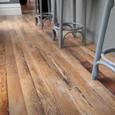 Urban Gray Galley Kitchen with Neutral Wood Floor