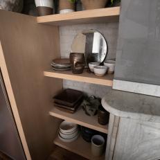 Urban Gray Galley Kitchen with Neutral Wood Shelves 