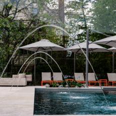 Swimming Pool With Arching Fountains