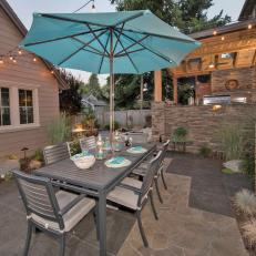 Outdoor Dining Table With Blue Umbrella