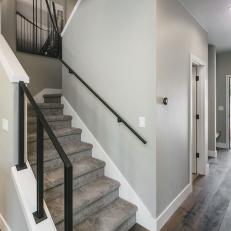 Gray Front Entryway Leading to Staircase 