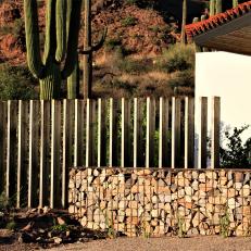 Steel Fins and Stone Gabion Wall