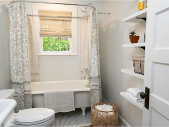 As seen on Home Town, the Guay Residence has been fully renovated by Ben and Erin Napier in Laurel, Mississippi.  The dirty and dark bathroom has been completely modified.  A new claw foot tub and bright colors have created a bright and clean renovated space. (After 10)