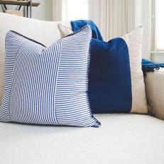 Blue and White Pillows on Sofa