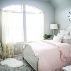 Gray Girl's Bedroom With Pink Bed Linens