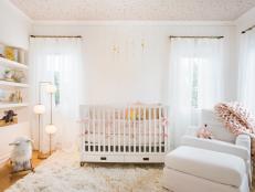 Wake + Loom infused this nursery with soft and whimsical touches, creating a peaceful space fitting for the new baby.
