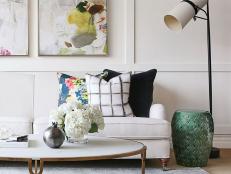 A bold chic living room pillow look from HGTV Magazine.