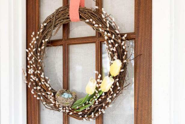 Spring wreath with bird to hang against a door
