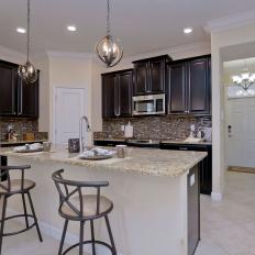 Open Plan Kitchen With Silver Barstools