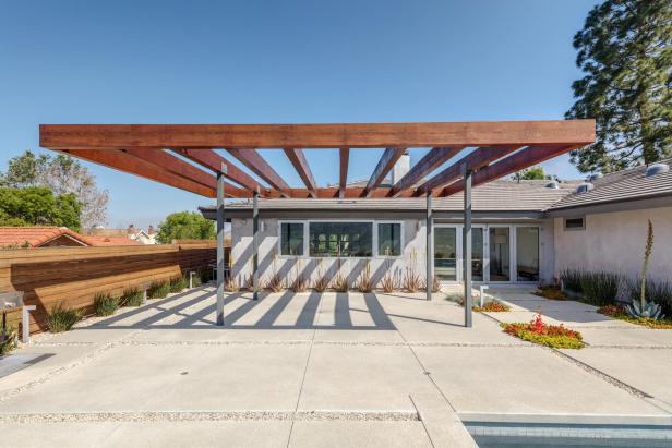 Concrete Patio And Wood Pergola Hgtv