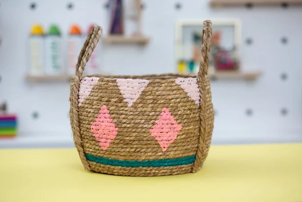 Freehand or trace patterns onto the basket with acrylic paint.