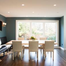 Blue Dining Area With Leather Banquette