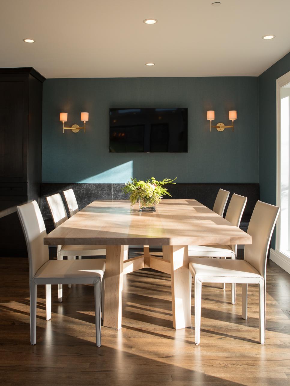 Blue Dining Area With Brass Sconces HGTV