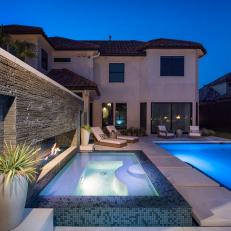 Modern Backyard at Night With Pool