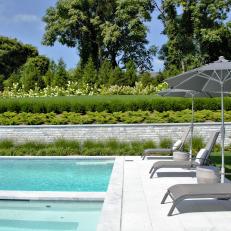 Pool and Patio With Gray Chairs