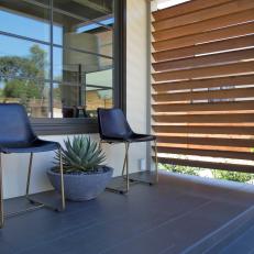 Contemporary Front Porch With Black Chairs