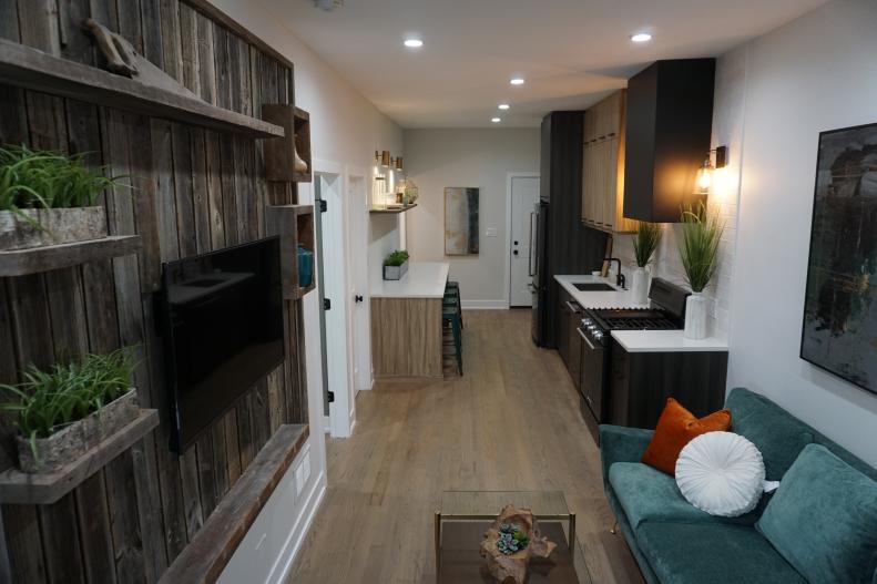 The renovated units in the Lincoln Park Fourplex  featured on Windy City Rehab were designed to maximize the space and provide everything a potential renter could desire, including a custom barnwood entertianment wall and an upgraded kitchen with high end finishes and appliances.