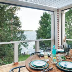 Deck Dining Area With Lake View