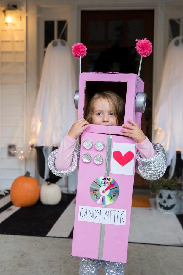 A Pink Astronaut Halloween Costume Made out of Cardboard