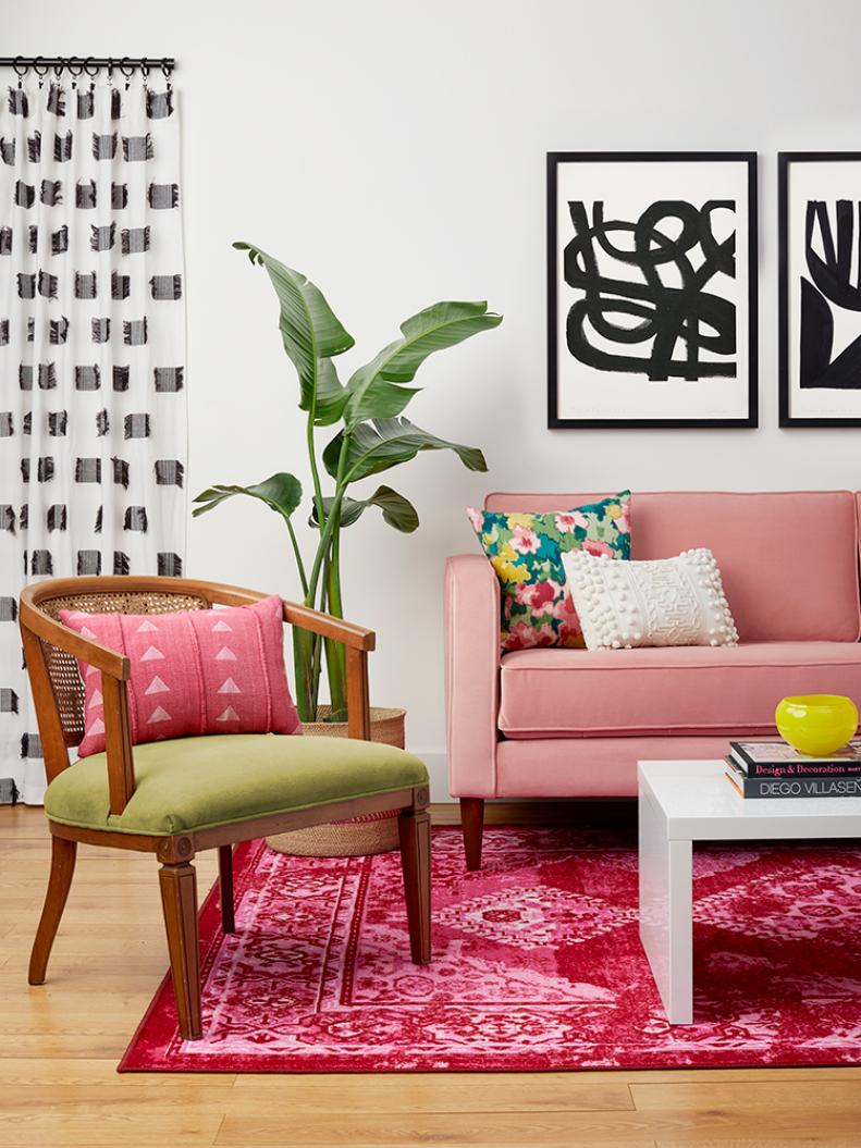 Next to a slew of punchy pinks, the chair’s original green velvet looks fresh and fun. (Pillows and a rug alone can do the trick if you’re not in the market for a new sofa.) Black-and-white accents add polish but let the colors do their thing.