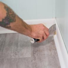How to Install Laminate Flooring: Fill Nail Holes With Wood Putty