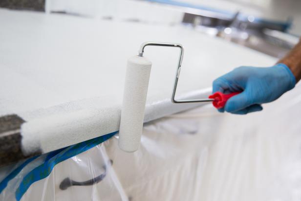 Apply an even coat of primer, covering the entire surface, with full roller strokes from front to back.