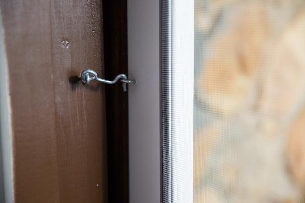 Make sure that the new handle will not interfere with the existing exterior door handle. Mark and drill the holes for the new screen door handle and install the hardware, following the instructions