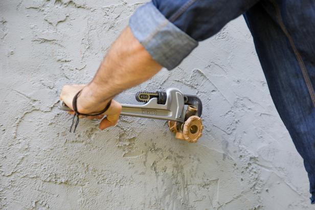 Using a pipe wrench, turn your spigot counterclockwise to unthread the connection to the water line. Once the spigot is fully disconnected, you should be able to remove it from the building.