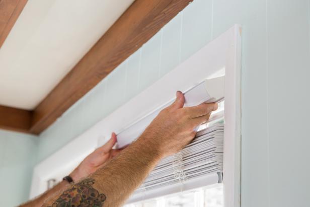 Once all brackets are securely attached to the window casing, you’re ready to place your blinds into the brackets and lock them into place.