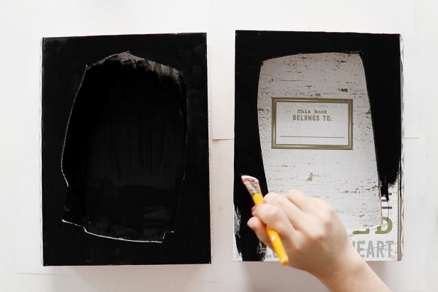 Paint the hollowed out book boxes black, or any color of your choosing.