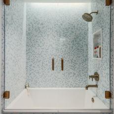 Modern Soaking Tub With Floor-To-Ceiling Mosaic Tiles