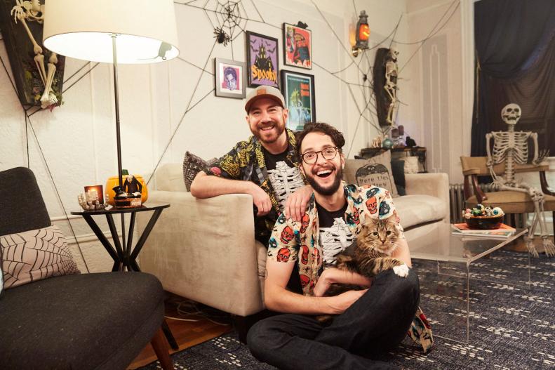 Dennis Setteducati and Andrew Boza in living room with Halloween decor