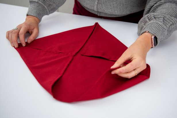 Impress your guests this holiday season with a poinsettia napkin.