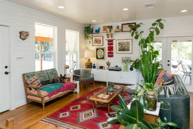 Living Room With Southwestern Art, Pillows and Midcentury Modern Sofas