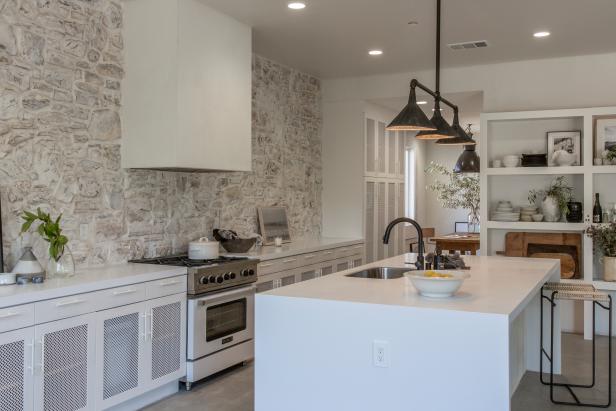 Rustic White Kitchen with White Stone Accent Wall | HGTV