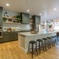 Rustic Neutral Kitchen with White Tile Backsplash and Green Cabinets 
