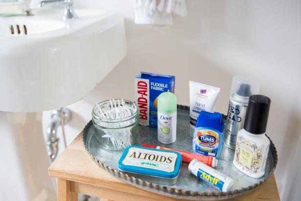 A Tray in a Bathroom With Products for Guests to Use