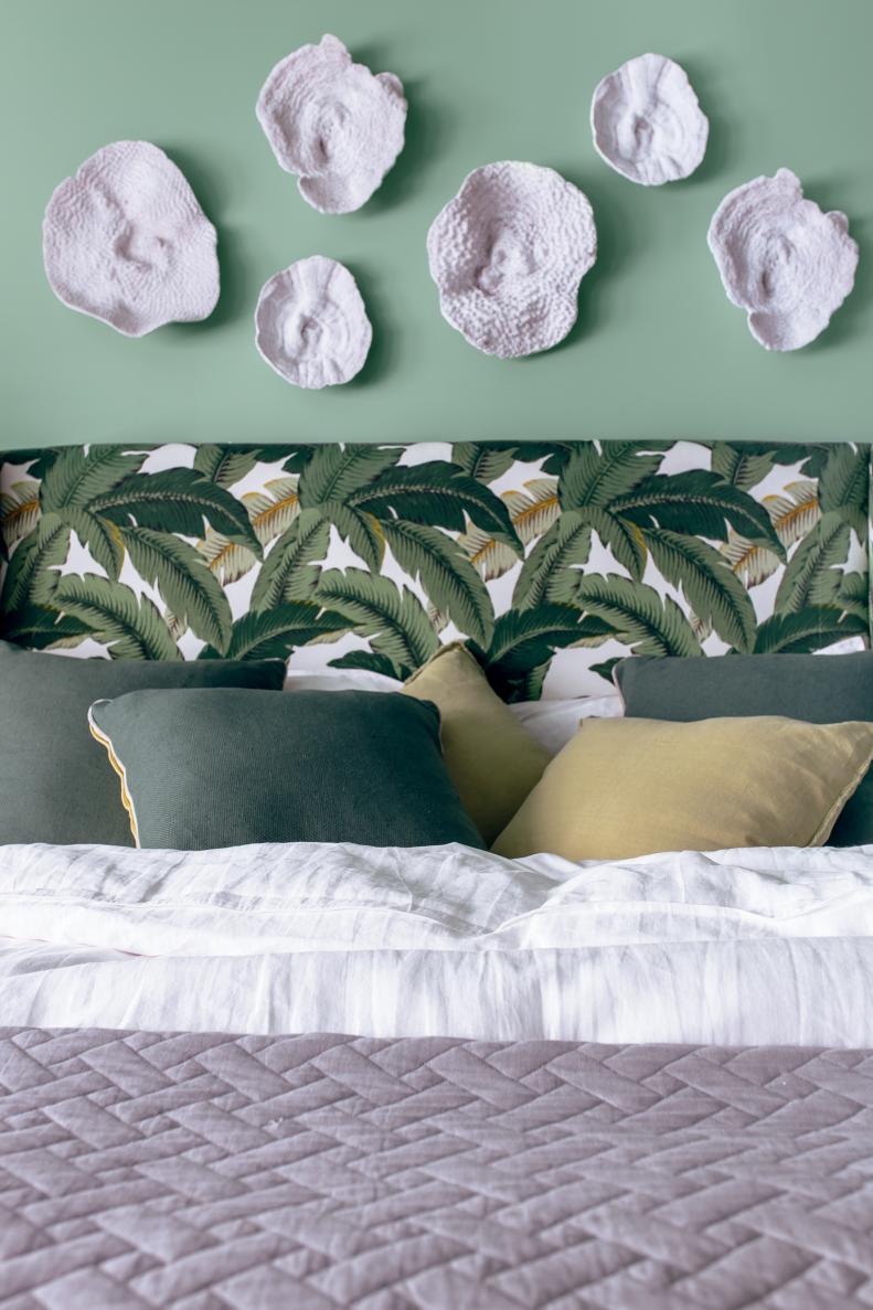 White Sea Coral Pieces on Wall Above Bed in Green Bedroom