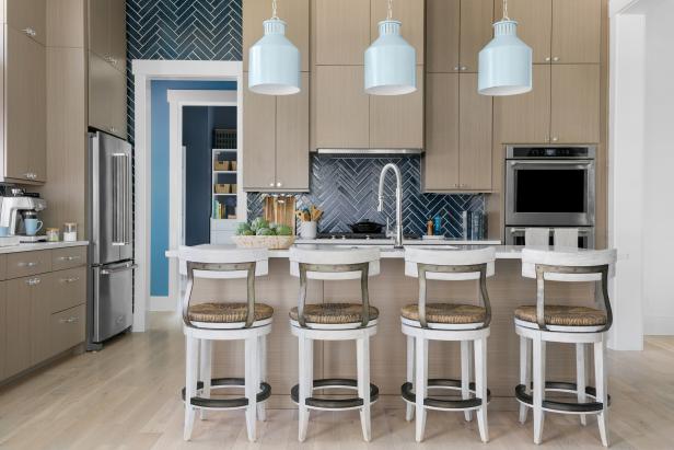 Blue Coastal Eat-In Kitchen With Large Island and Light Wood Cabinets