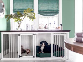This laundry room and mudroom includes this double wide ventilated pet crate outfitted with a comfy dog bed and pet toys that gives the furry members of the family a comfortable spot for lounging. “If you’re someone who has a pet that needs to be put away during entertaining time, it’s super-friendly because there’s a lot of room for them to move around,” says designer Brian Patrick Flynn.