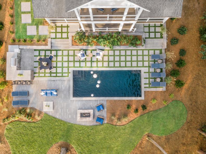 Concrete-Paver-and-Grass Patio Creates Geometric Design Around Pool