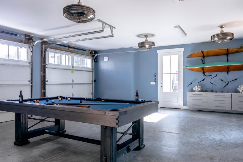 Blue Garage With Pool Table Doubles As Game Room