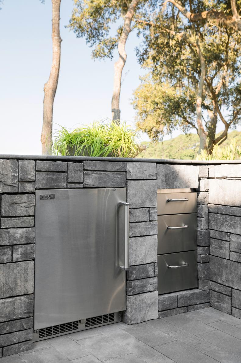 Built-In Refrigerator and Storage in Outdoor Patio Kitchen