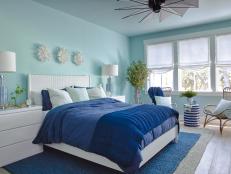Blue Coastal-Style Bedroom With Blue and White Accents Throughout