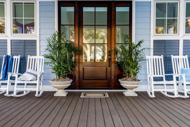 Planters and Rocking Chairs on Either Side of Front Door
